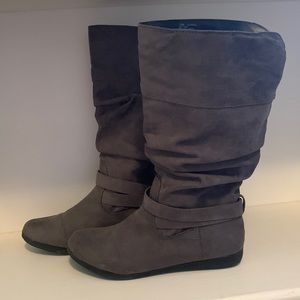 Women’s grey suede semi-tall boots.